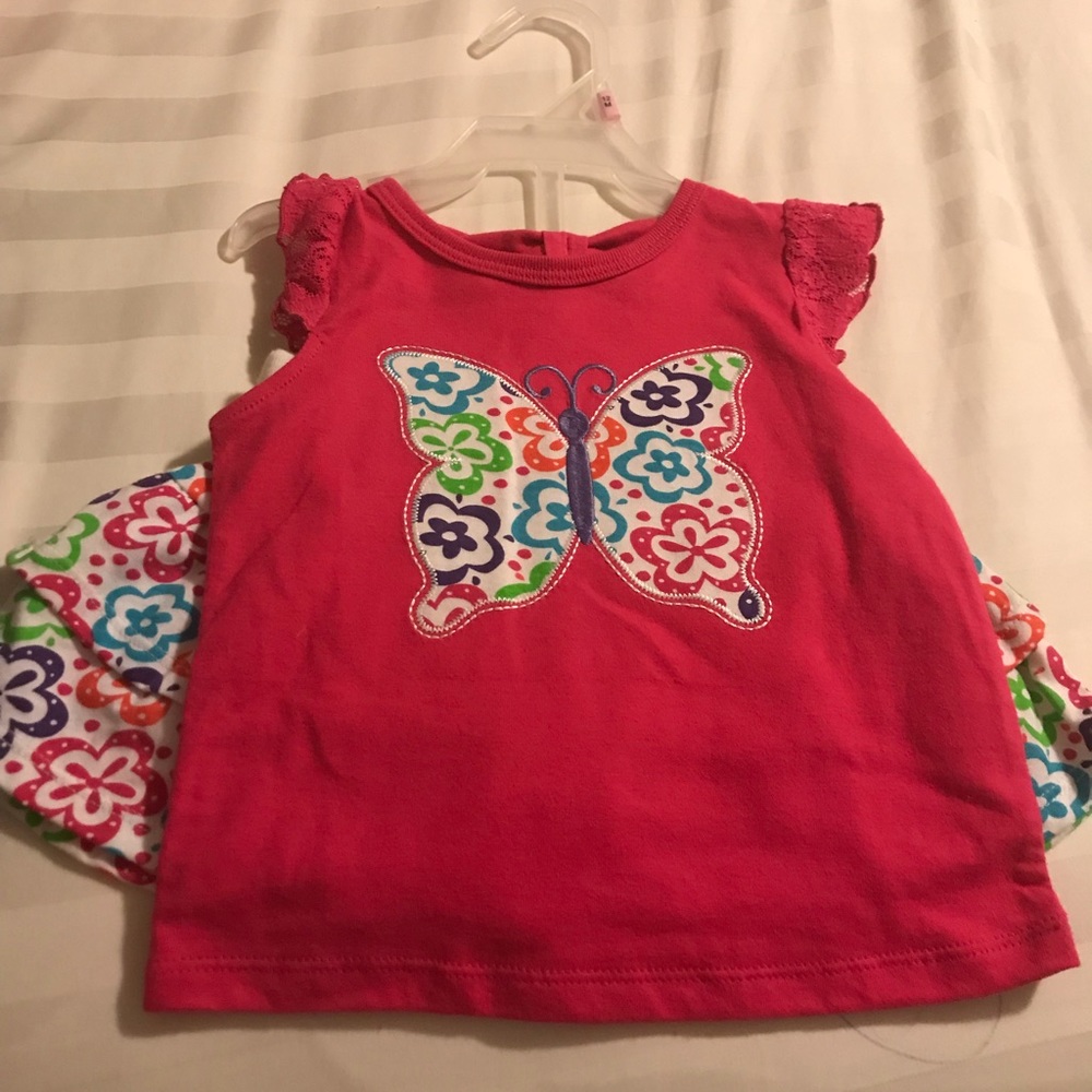 Butterfly shirt with matching skirt. Never worn.
